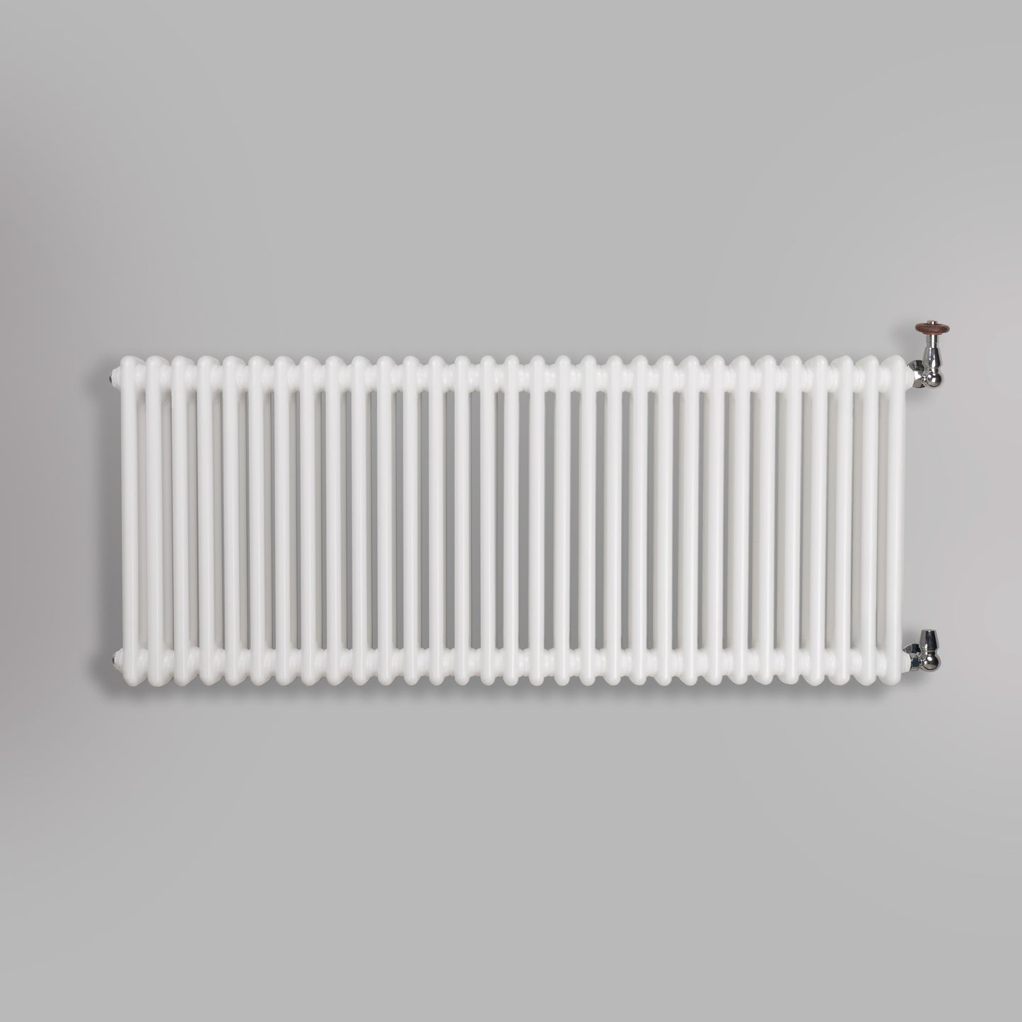 Grzejnik Dekoracyjny Żeberkowy - 2 Kolumnowy Biały - 576x1415mm, gładkie tło firmy Empire