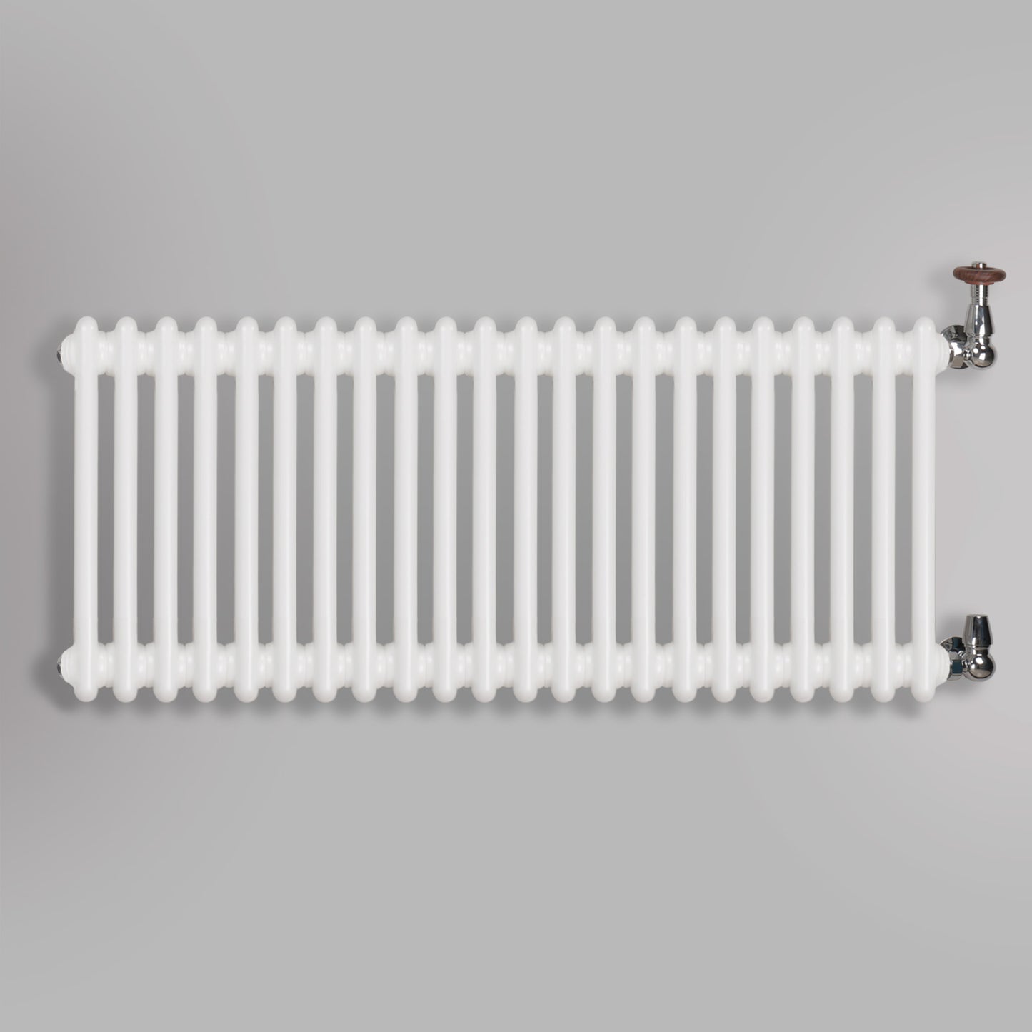 Grzejnik Dekoracyjny Żeberkowy - 3 Kolumnowy Biały - 426x1010mm, gładkie tło firmy Empire
