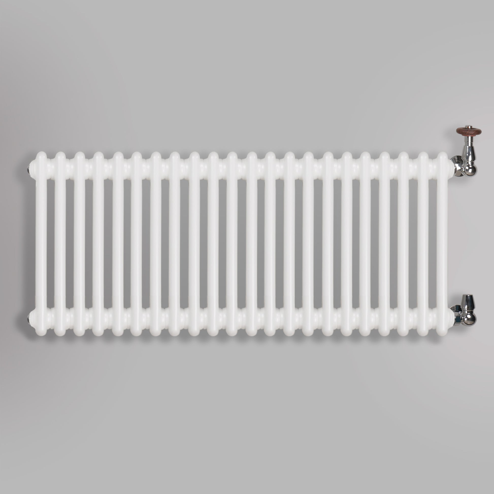Grzejnik Dekoracyjny Żeberkowy - 3 Kolumnowy Biały - 426x1010mm, gładkie tło firmy Empire