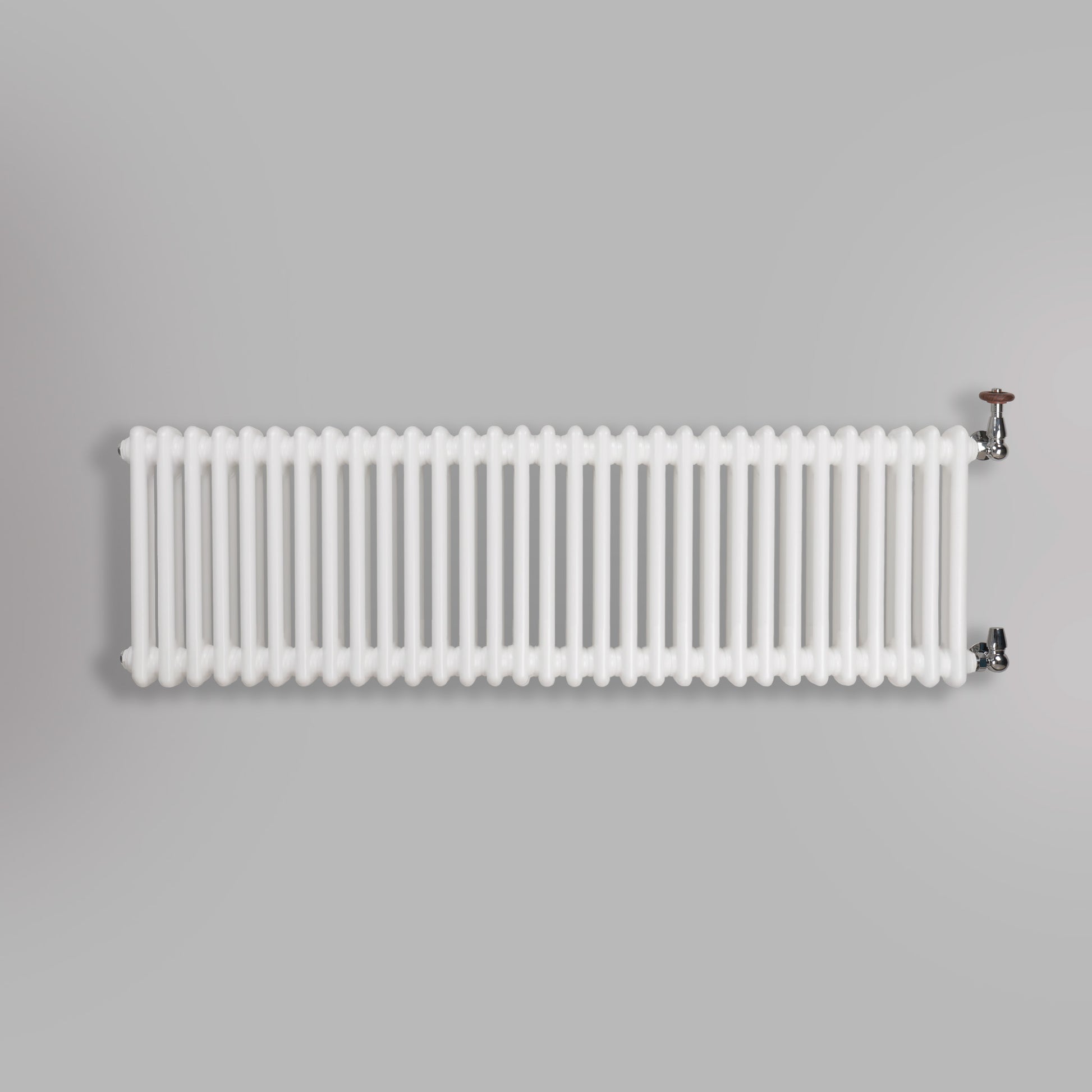 Grzejnik Dekoracyjny Żeberkowy - 3 Kolumnowy Biały - 426x1415mm, gładkie tło firmy Empire