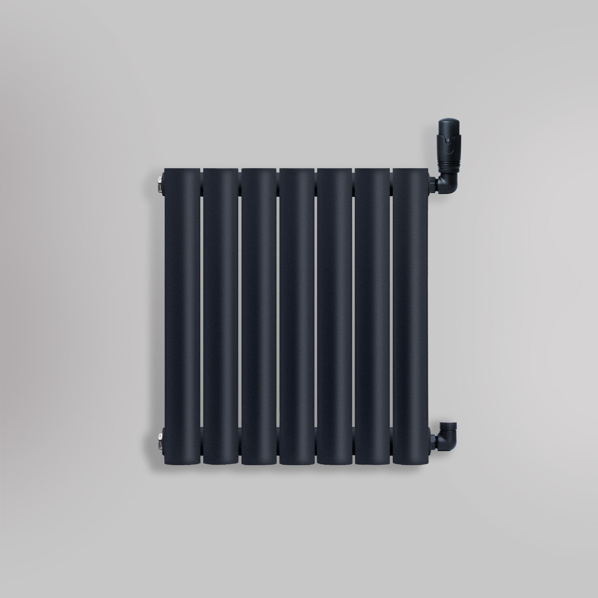 Grzejnik Dekoracyjny - Owalny Kolumnowy Antracytowy - 545x410mm, gładkie tło firmy Heissmann