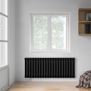 Grzejnik Dekoracyjny - Owalny Podwójny Kolumnowy Czarny - 560x1180mm, poziomy grzejnik dekoracyjny na ścianie firmy Heissmann