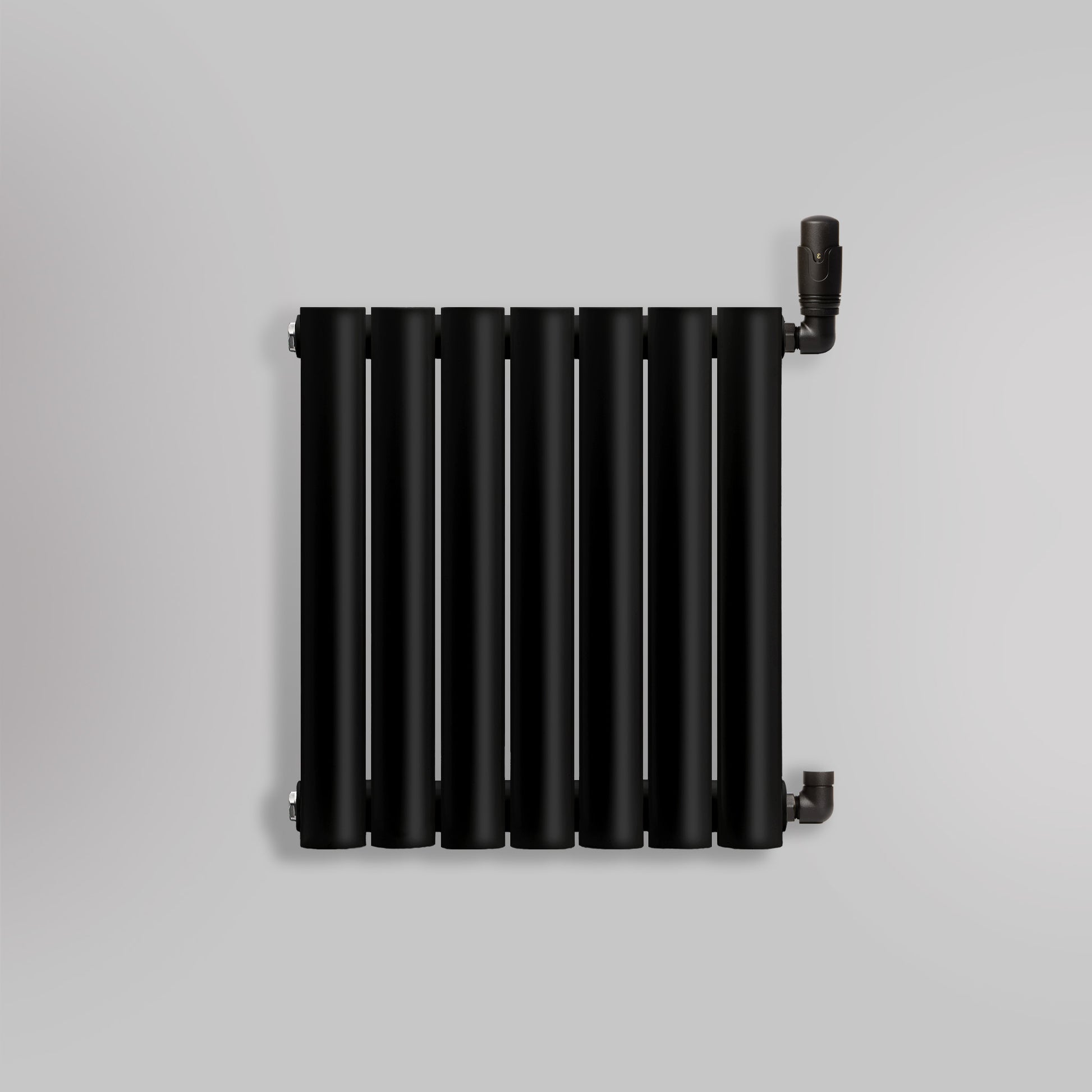 Grzejnik Dekoracyjny - Owalny Kolumnowy Czarny - 545x410mm, gładkie tło