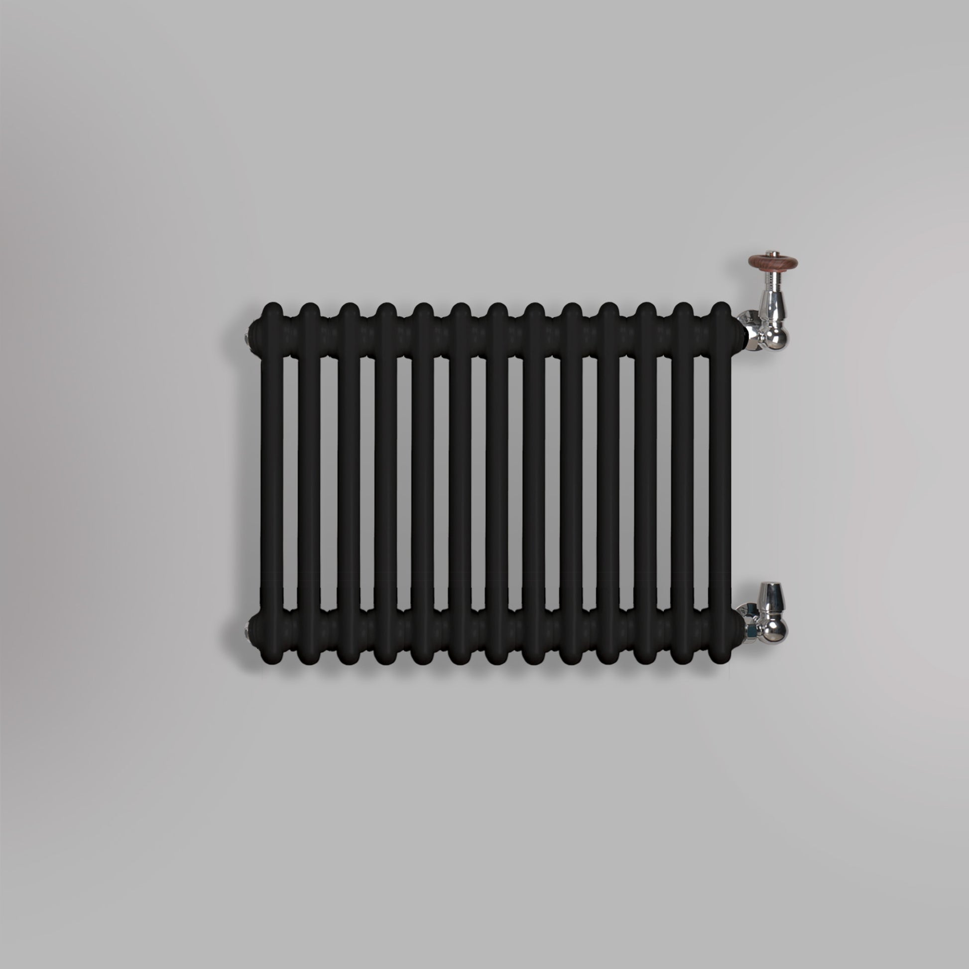 Grzejnik Dekoracyjny Żeberkowy - 3 Kolumnowy Czarny - 426x605mm, gładkie tło firmy Empire