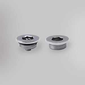 Zawór odpowietrzający i zaślepki - Chrom, dekoracyjne korki grzejników - gładkie tło